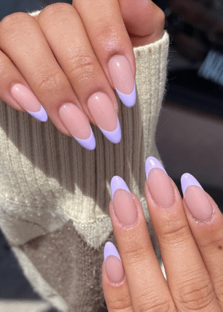 Beautiful French nails with round corners, a combo of white and pink nail paint