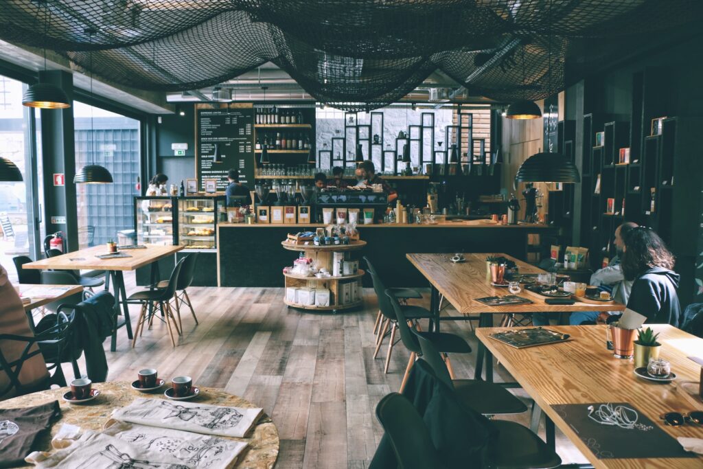 people inside cafe enjoying delicious meal 