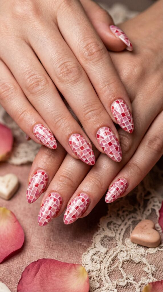 Pink and red mosaic tile pattern nail art on almond nails