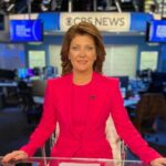 Norah O'Donnell in the pink sexy outfit and brown shoes while poses for a photo